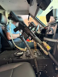 Close-up of a rifle secured in the StandA.R.D. inside an IAG Sentinel cab