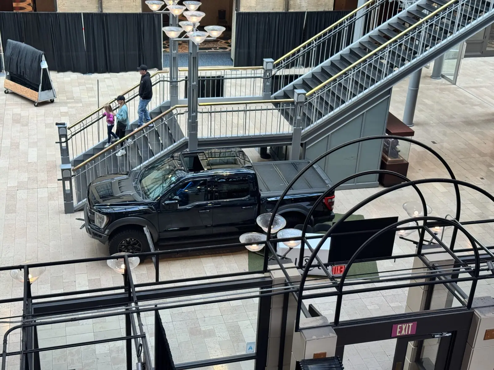 Overhead view of the Pl8tek truck display on the expo floor.